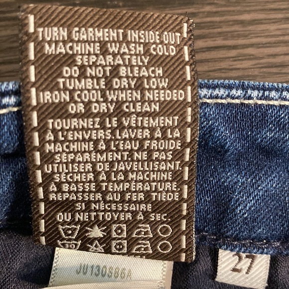 7 for all mankind boot cut flare jeans. Size 27. Medium wash. Faded front. - Picture 12 of 16